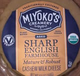 Miyoko's Kitchen Inc. Semi firm aged sharp english farmhouse cheese wheel made from plants, sharp english farmhouse